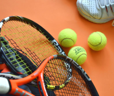 Sports Equipment with tennis racket and balls