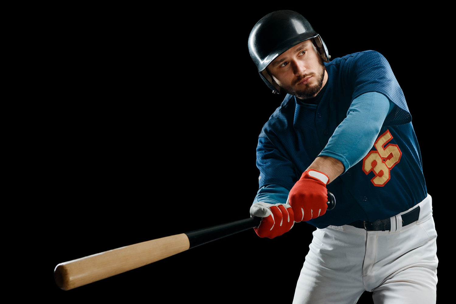 Baseball player swinging a bat